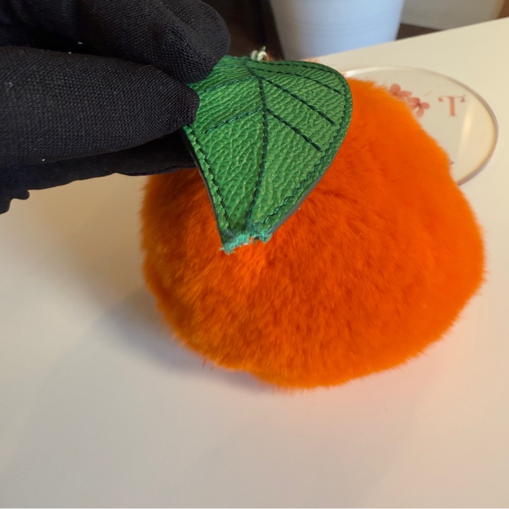 Orange Furry Pom Pom Keychain with Green Leaf - Picture 3 of 12